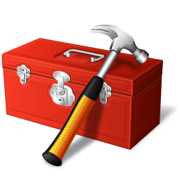 A hammer leaning on a tool box.